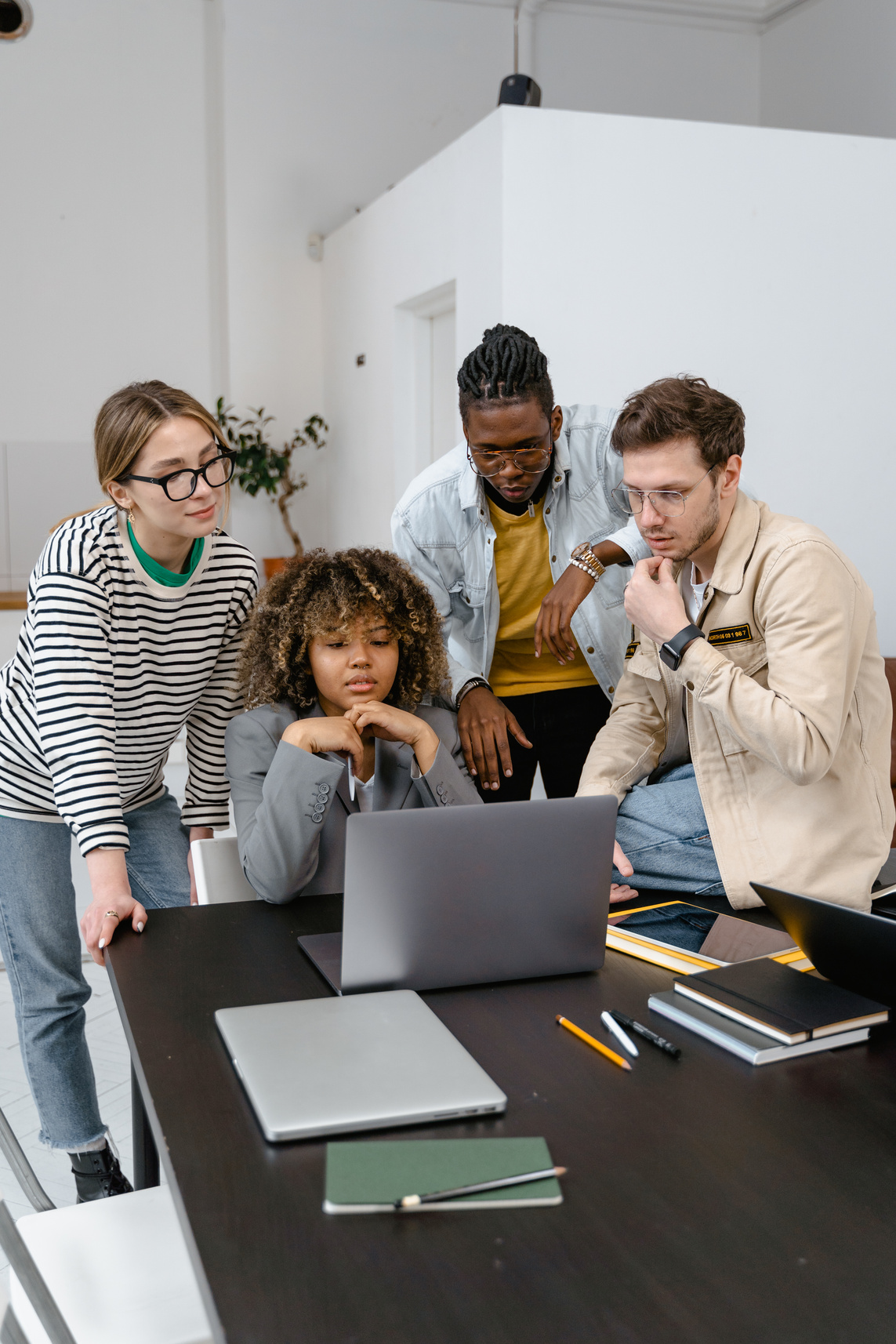 People Having a Meeting in Front of the Laptop